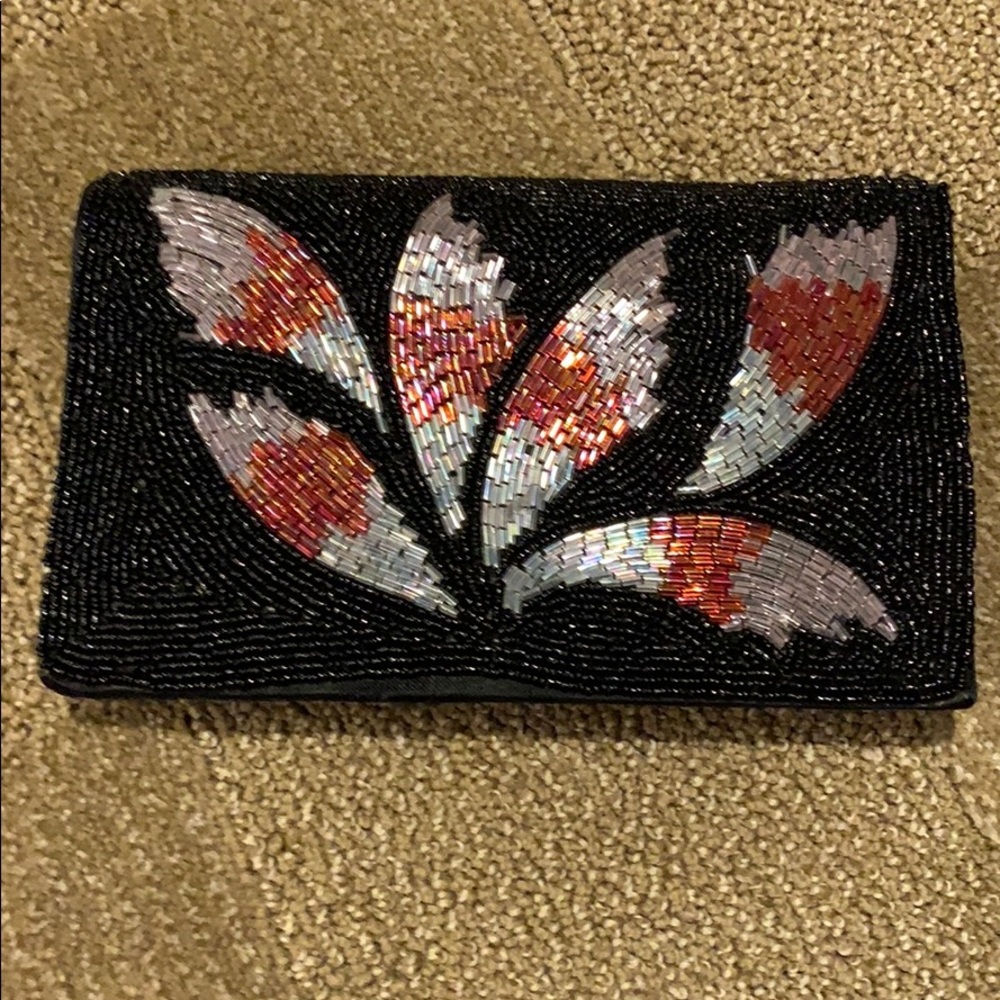 Expandable sequin cross body evening bag